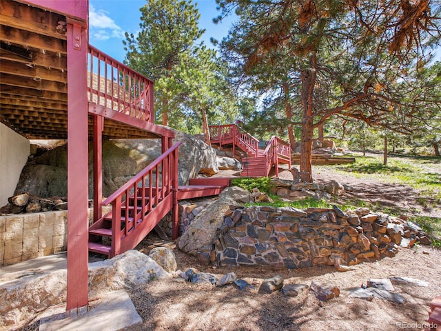 8791 Grizzly Way, Evergreen, CO 80439 - view of yard with stairway and a deck
