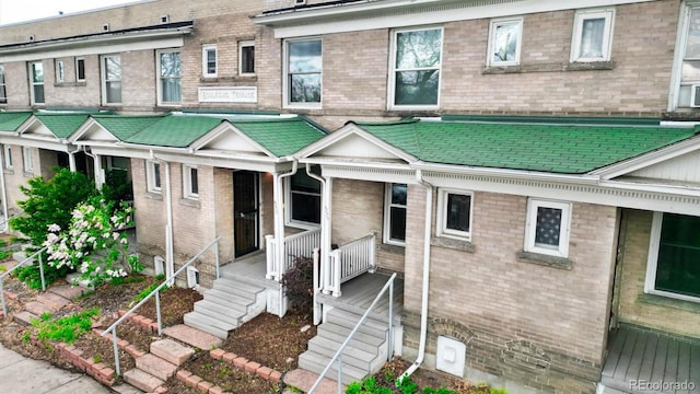 553 N Logan St, Denver, CO 80203 - view of property with brick siding