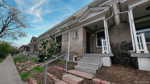 553 N Logan St, Denver, CO 80203 - exterior space featuring brick siding