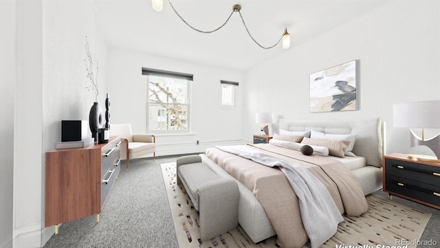 553 N Logan St, Denver, CO 80203 - bedroom with light carpet and baseboards