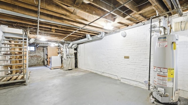 553 N Logan St, Denver, CO 80203 - unfinished basement with brick wall, water heater, heating unit, and washer / dryer
