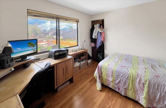 bedroom featuring light wood-type flooring