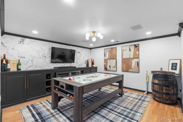 5955 Blue Sage Way, Littleton, CO 80123 - playroom featuring ornamental molding, a chandelier, light wood-style floors, and recessed lighting