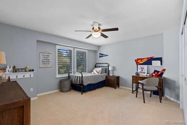 5955 Blue Sage Way, Littleton, CO 80123 - bedroom featuring carpet and a ceiling fan