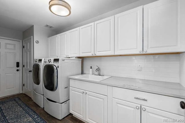 5955 Blue Sage Way, Littleton, CO 80123 - laundry room with washing machine and dryer and cabinet space
