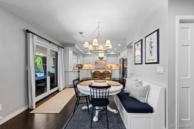 5955 Blue Sage Way, Littleton, CO 80123 - dining space with a chandelier and baseboards
