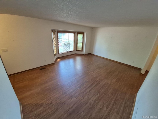 3136 S Cathay Cir, Aurora, CO 80013 - unfurnished room with wood finished floors and baseboards