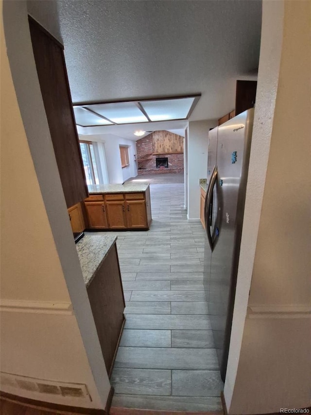 3136 S Cathay Cir, Aurora, CO 80013 - corridor with a textured ceiling and baseboards