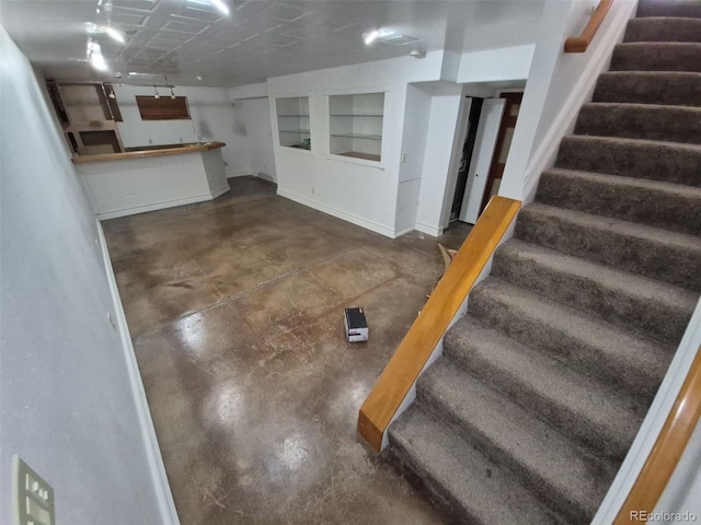3136 S Cathay Cir, Aurora, CO 80013 - finished below grade area featuring stairs and baseboards