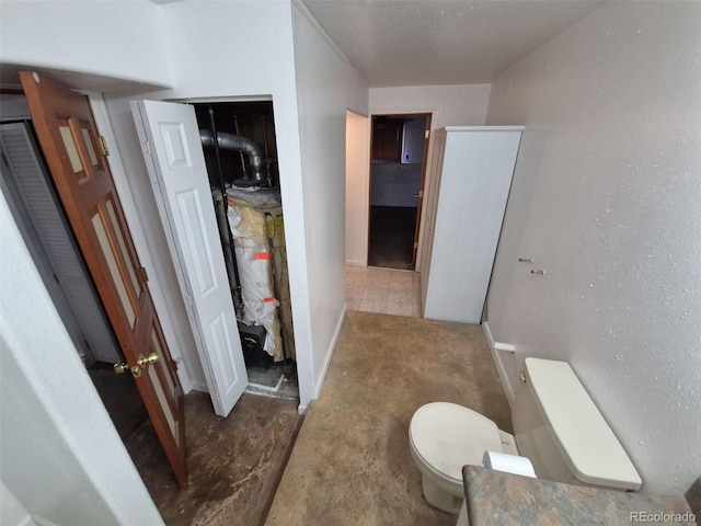 3136 S Cathay Cir, Aurora, CO 80013 - bathroom featuring toilet and baseboards