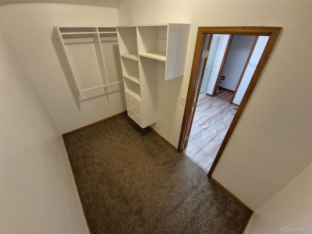 3136 S Cathay Cir, Aurora, CO 80013 - spacious closet with dark colored carpet