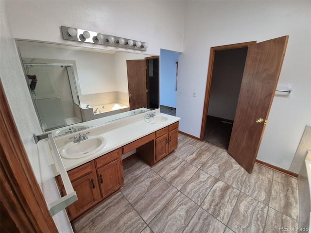 3136 S Cathay Cir, Aurora, CO 80013 - full bath featuring a bath, a shower stall, and double vanity