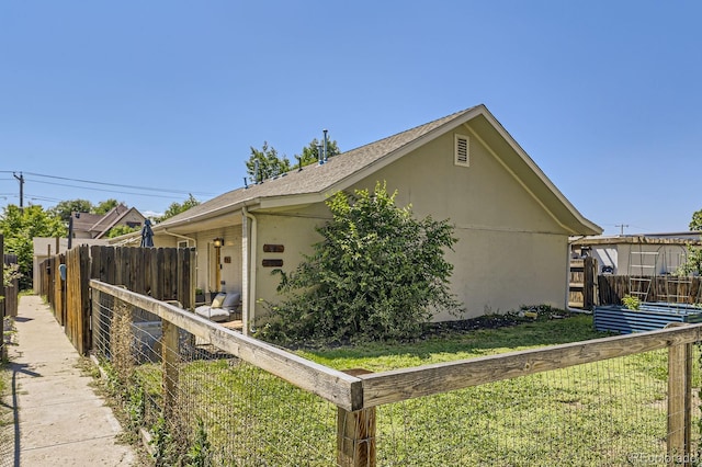2841 N Columbine St, Denver, CO 80205 - view of side of home with stucco siding
