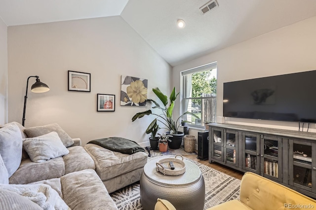 2841 N Columbine St, Denver, CO 80205 - living area with vaulted ceiling and wood finished floors
