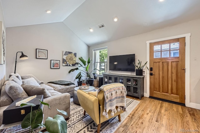 2841 N Columbine St, Denver, CO 80205 - living room featuring light wood-style flooring and lofted ceiling