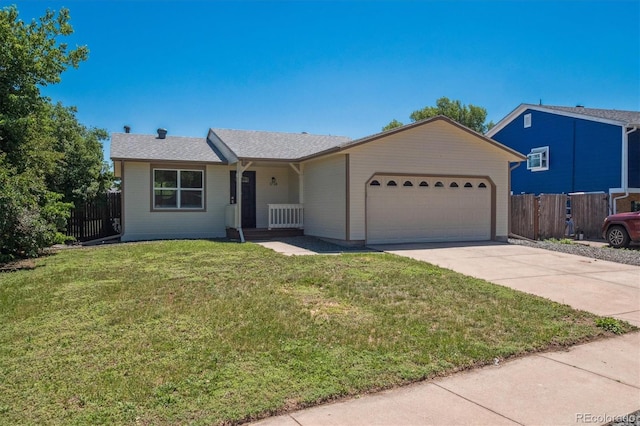 1718 S Flanders Way, Aurora, CO 80017 - ranch-style home with an attached garage and concrete driveway