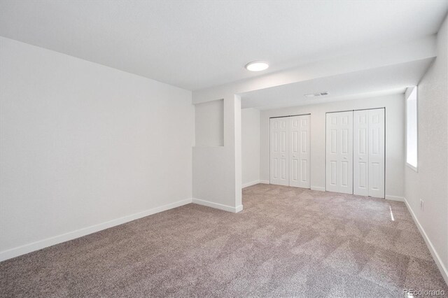 1718 S Flanders Way, Aurora, CO 80017 - unfurnished bedroom with two closets and carpet
