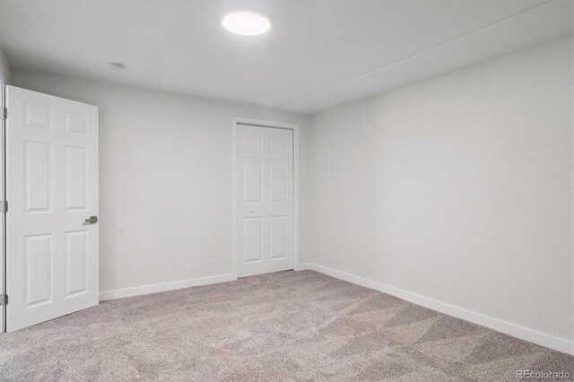 1718 S Flanders Way, Aurora, CO 80017 - unfurnished bedroom with carpet floors and a closet