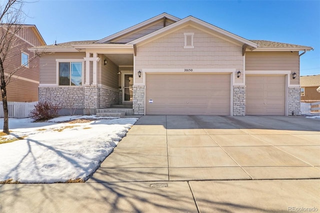 view of front of property with a garage