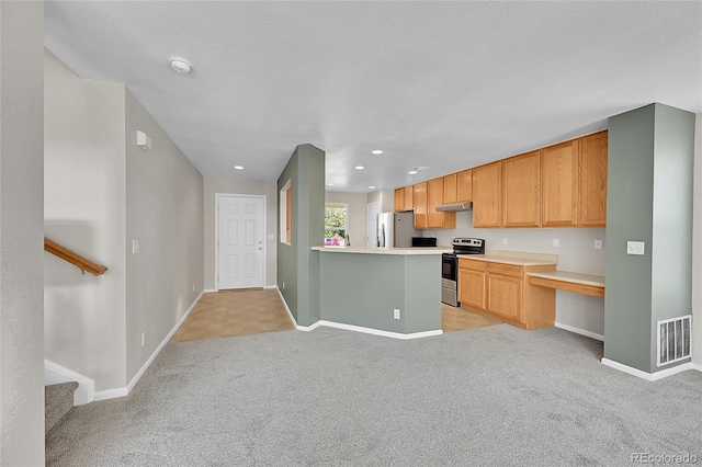 5564 Kalispell St, Denver, CO 80239 - kitchen featuring stainless steel appliances, light carpet, under cabinet range hood, light countertops, and a peninsula