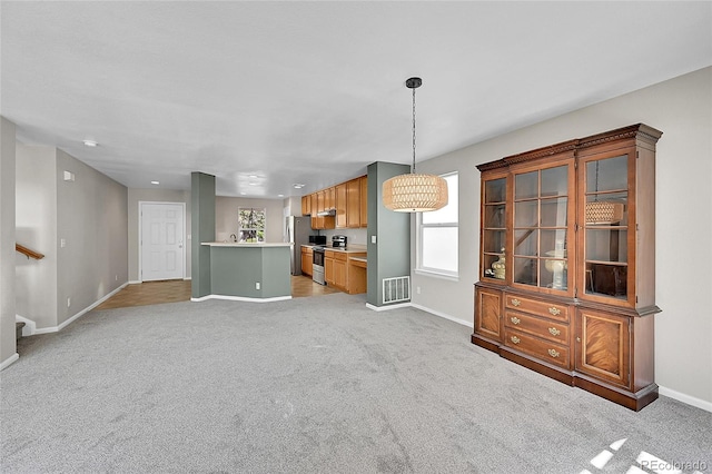 5564 Kalispell St, Denver, CO 80239 - living room with light carpet