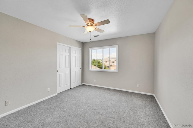 5564 Kalispell St, Denver, CO 80239 - unfurnished bedroom with carpet, a closet, and a ceiling fan