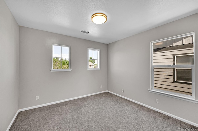 5564 Kalispell St, Denver, CO 80239 - carpeted spare room featuring baseboards
