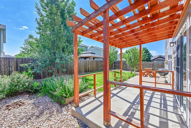 5564 Kalispell St, Denver, CO 80239 - fenced backyard featuring a pergola and a patio area
