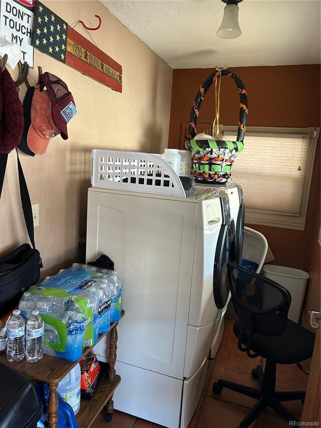 300 3rd St, Saguache, CO 81149 - laundry area with laundry area, tile patterned flooring, and washing machine and clothes dryer
