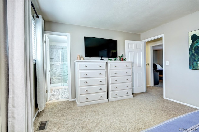 13915 W 73rd Ave, Arvada, CO 80005 - bedroom with light carpet and ensuite bathroom