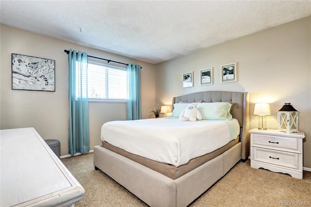 13915 W 73rd Ave, Arvada, CO 80005 - bedroom with light carpet and a textured ceiling