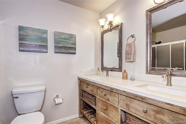 13915 W 73rd Ave, Arvada, CO 80005 - bathroom featuring double vanity and an enclosed shower