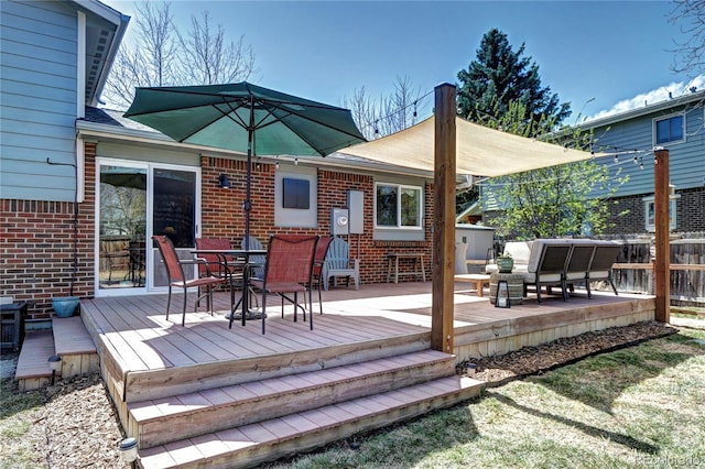 13915 W 73rd Ave, Arvada, CO 80005 - wooden terrace with outdoor dining space