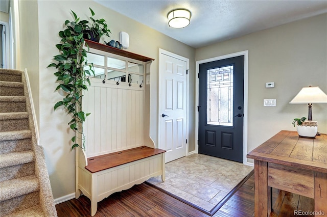 13915 W 73rd Ave, Arvada, CO 80005 - mudroom with wood finished floors and baseboards