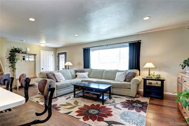 13915 W 73rd Ave, Arvada, CO 80005 - living room with hardwood / wood-style flooring, recessed lighting, and baseboard heating