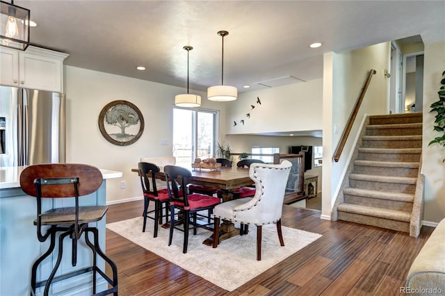 13915 W 73rd Ave, Arvada, CO 80005 - dining room featuring stairs, dark wood-style floors, and recessed lighting