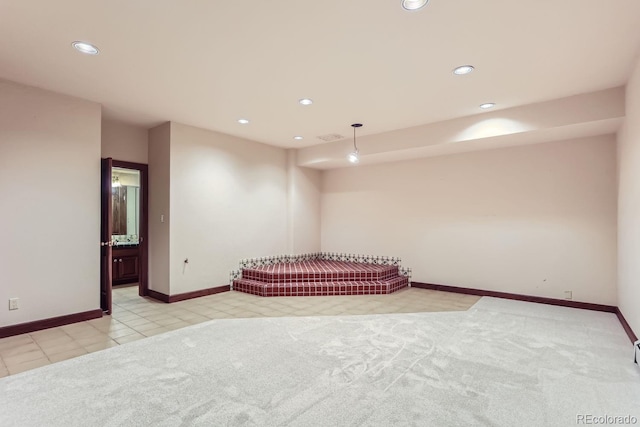 interior space featuring visible vents, recessed lighting, baseboards, and carpet floors