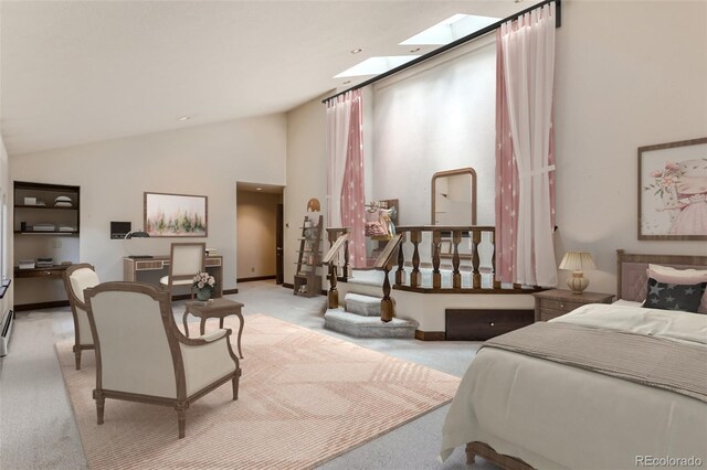 26600 Mowbray Ct, Evergreen, CO 80439 - bedroom featuring light carpet, lofted ceiling with skylight, and baseboards