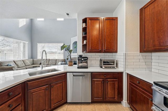11307 Navajo Cir Unit A, Westminster, CO 80234 - kitchen with decorative backsplash, dishwasher, light countertops, open floor plan, and open shelves