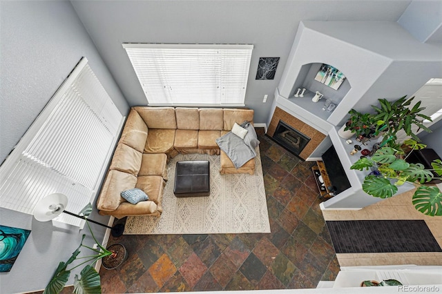 11307 Navajo Cir Unit A, Westminster, CO 80234 - living room with stone finish flooring and a fireplace