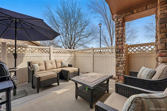 11307 Navajo Cir Unit A, Westminster, CO 80234 - fenced backyard with outdoor lounge area and a patio