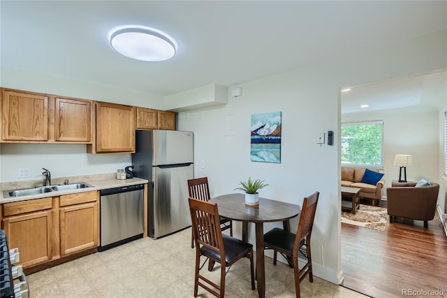 kitchen featuring appliances with stainless steel finishes and sink