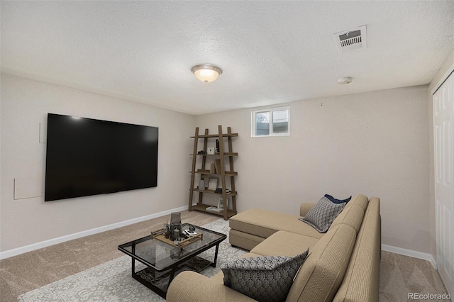 1920 Elmira St, Aurora, CO 80010 - living room featuring light colored carpet and a textured ceiling