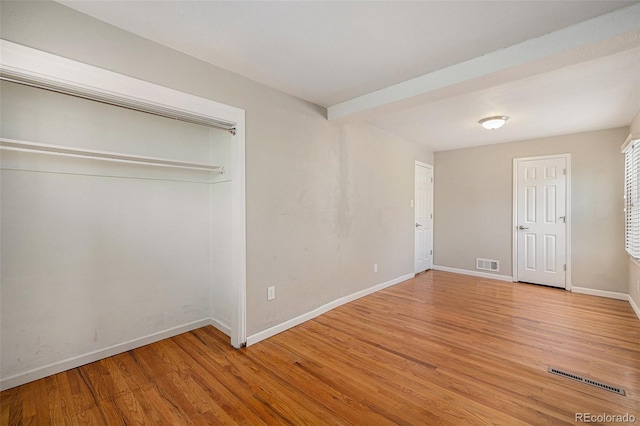 1920 Elmira St, Aurora, CO 80010 - unfurnished bedroom with wood finished floors and baseboards