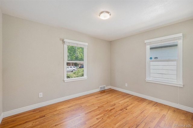 1920 Elmira St, Aurora, CO 80010 - unfurnished room with light wood-style floors and baseboards