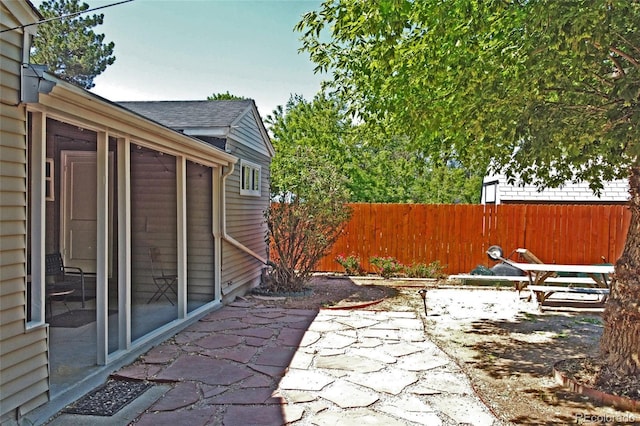 1920 Elmira St, Aurora, CO 80010 - view of patio / terrace featuring a sunroom