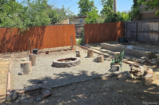1920 Elmira St, Aurora, CO 80010 - view of yard with an outdoor fire pit