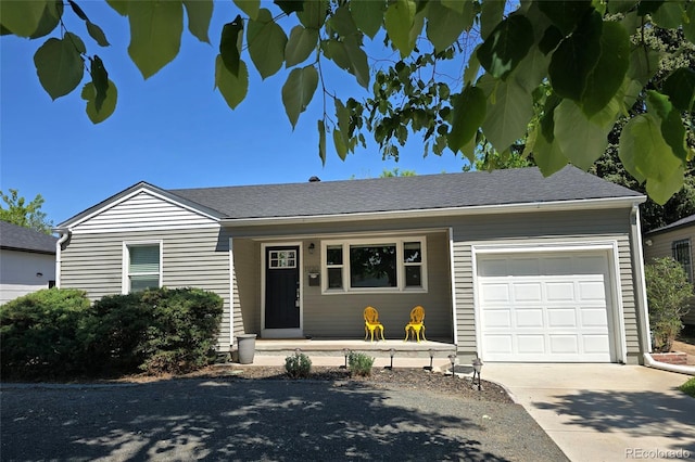 1920 Elmira St, Aurora, CO 80010 - single story home featuring an attached garage, concrete driveway, and a porch