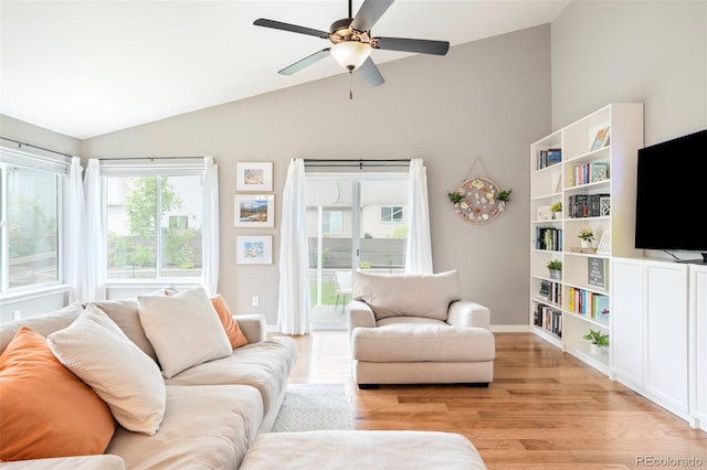 577 Tristan Pl, Berthoud, CO 80513 - living area featuring light wood-style flooring, a ceiling fan, baseboards, and high vaulted ceiling