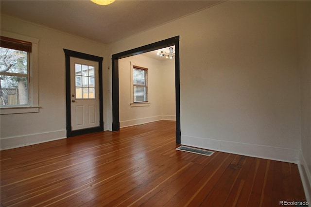 entryway featuring dark wood-type flooring